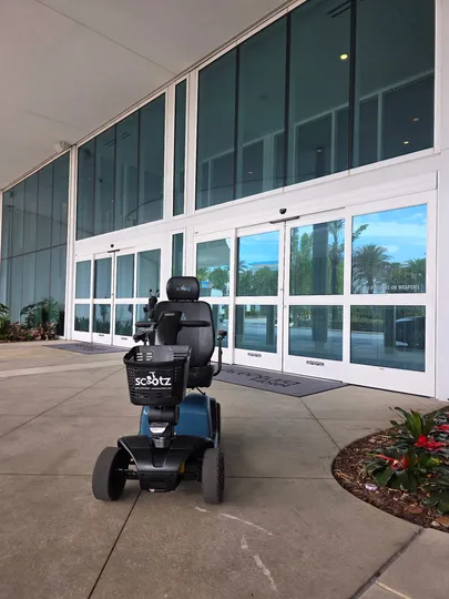 Blue and black Orlando mobility scooter rentals delivered for a trip to Disney Springs